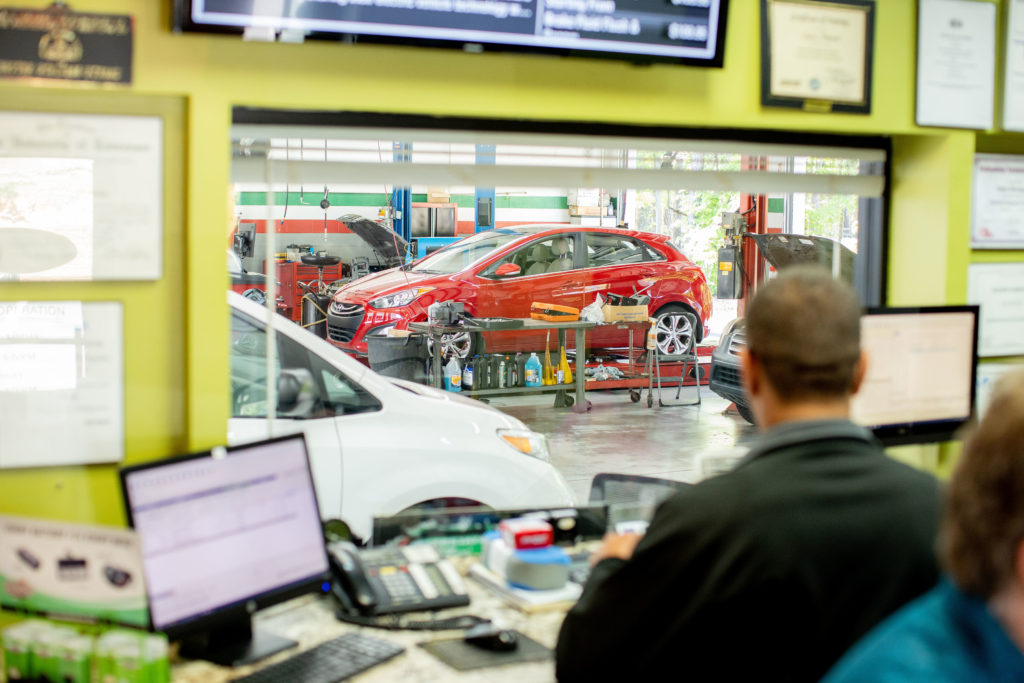 View of car shop inside the office