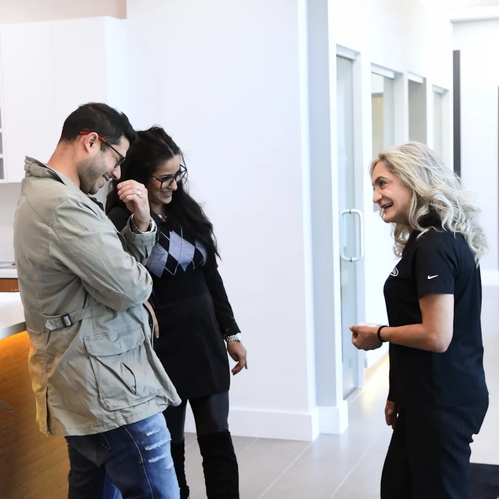 Japanese Auto Repair Customers Laughing